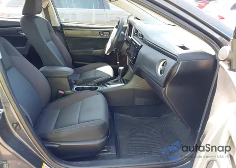 2017 Toyota Corolla Le z USA, uszkodzony, nr VIN 5YFBURHE4HP579903